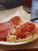 Breaded Veal Parmigiana with Spaghetti